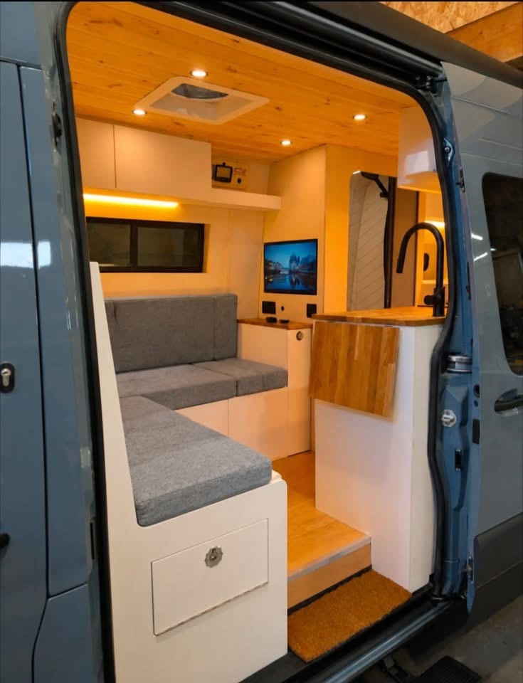 Full interior showing smart TV and lounge area